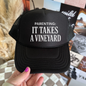 Parenting: It Takes a Vineyard Trucker Hat | Funny Mom Life Hat